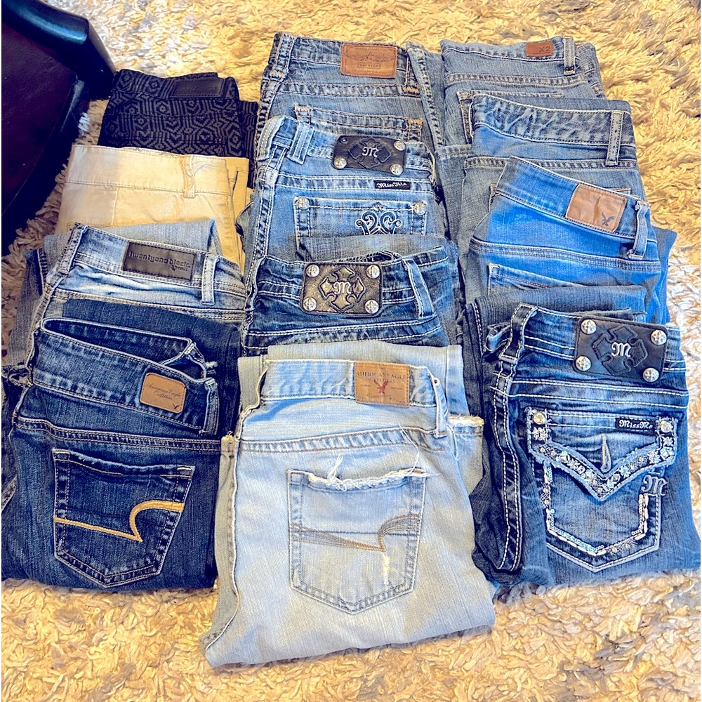 12 pairs of gently used jeans. BKE,Miss Me,Gap,Express,American Eagle andRue21.